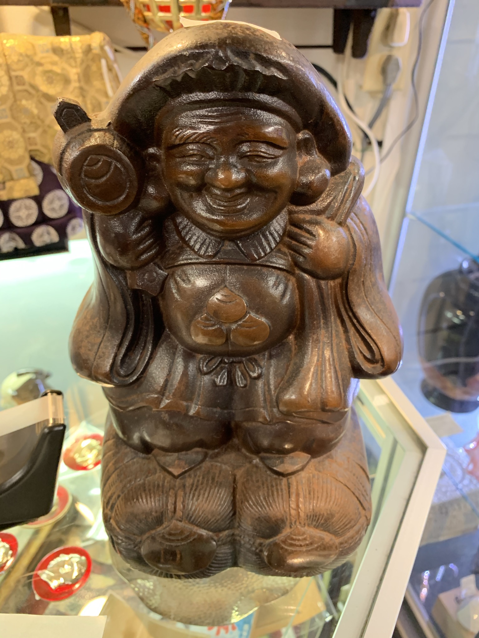 Cast metal fortune god 